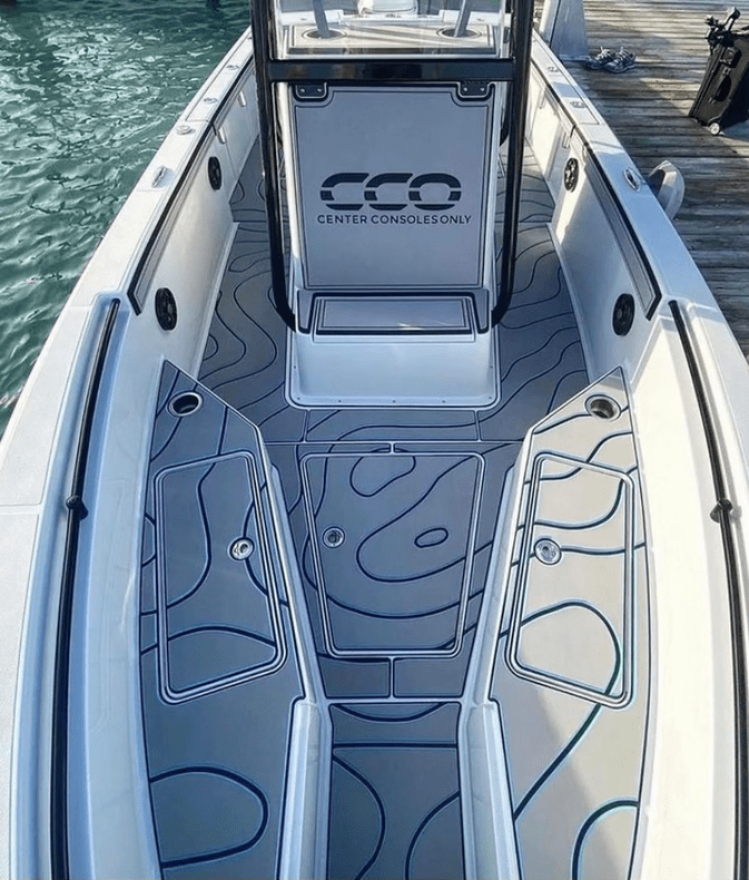 Custom routed panels around a center console and hatches