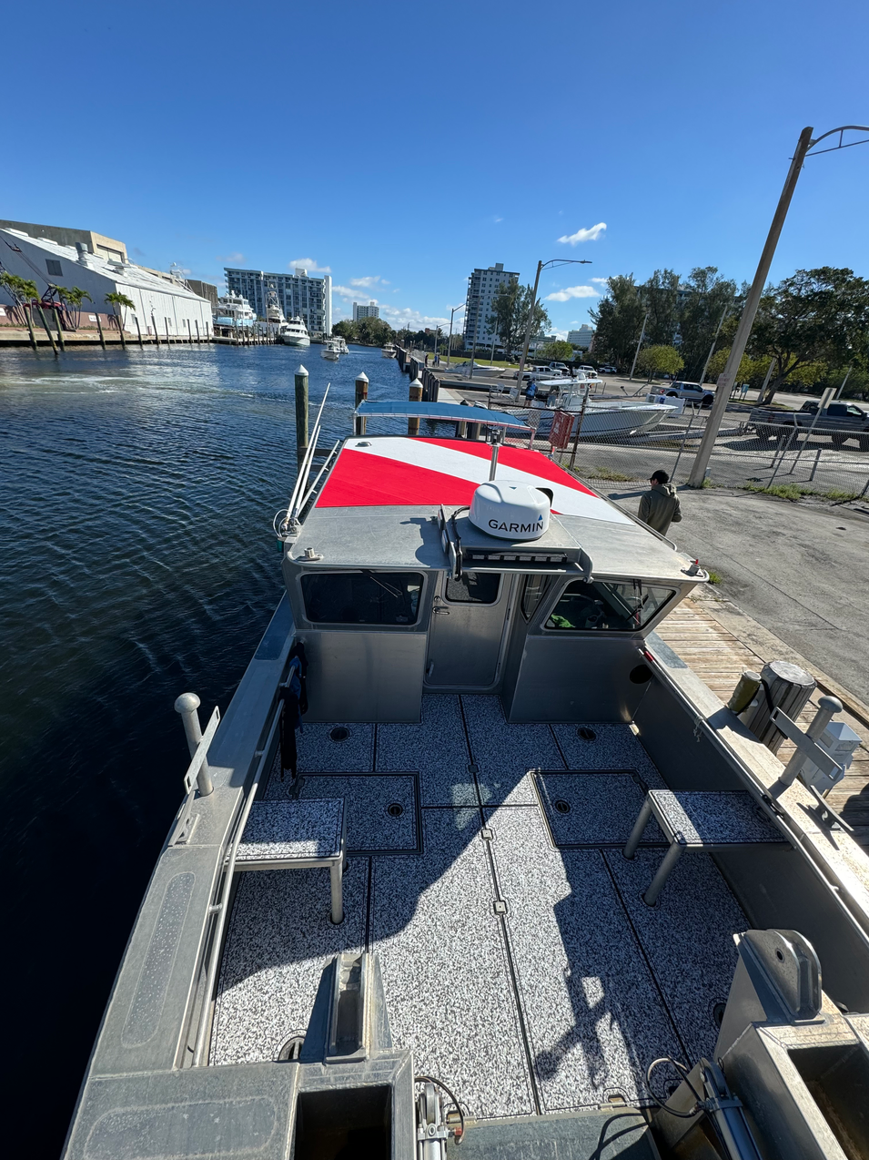Speckled decking across the working deck and hatch panels.