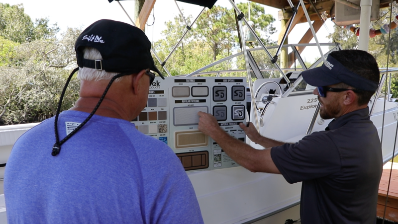 DIY vs Professional SeaDek Installation showing MarineDex installers reviewing deck measurements before SeaDek installation