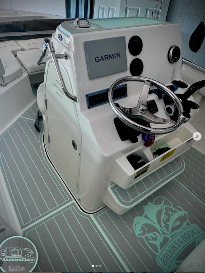 seadek lifespan florida Boat helm station with SeaDek flooring featuring a custom compass rose design