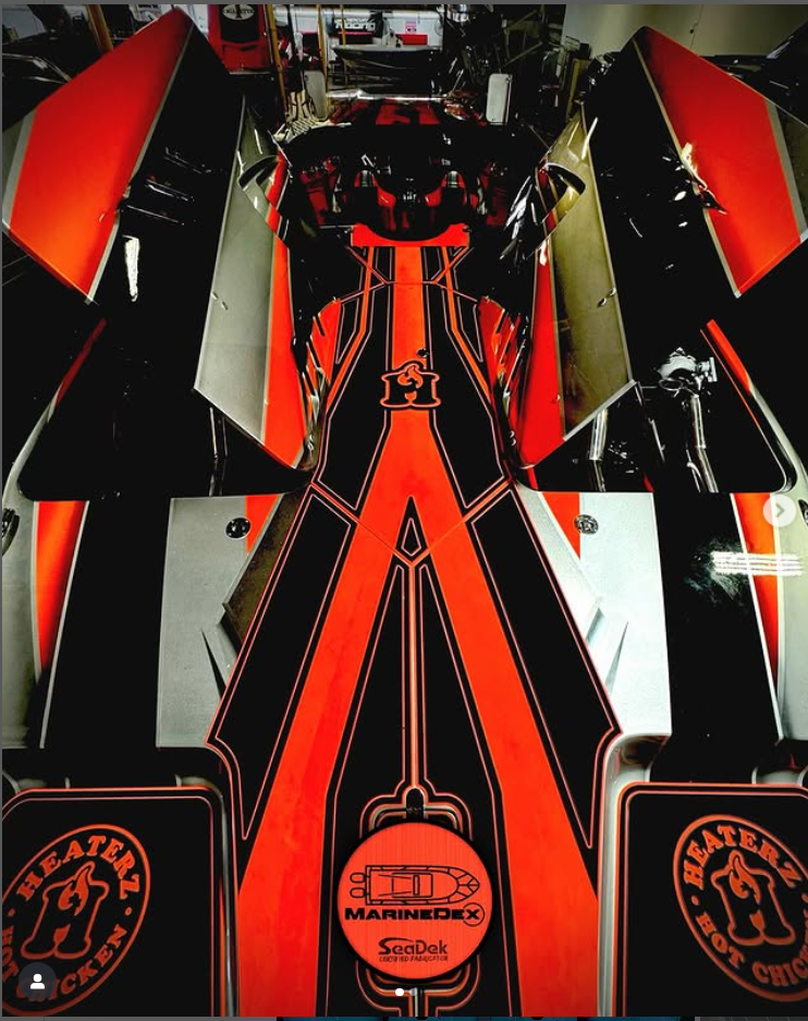 Red and black custom SeaDek marine flooring design featuring bold geometric lines and MarineDex branding