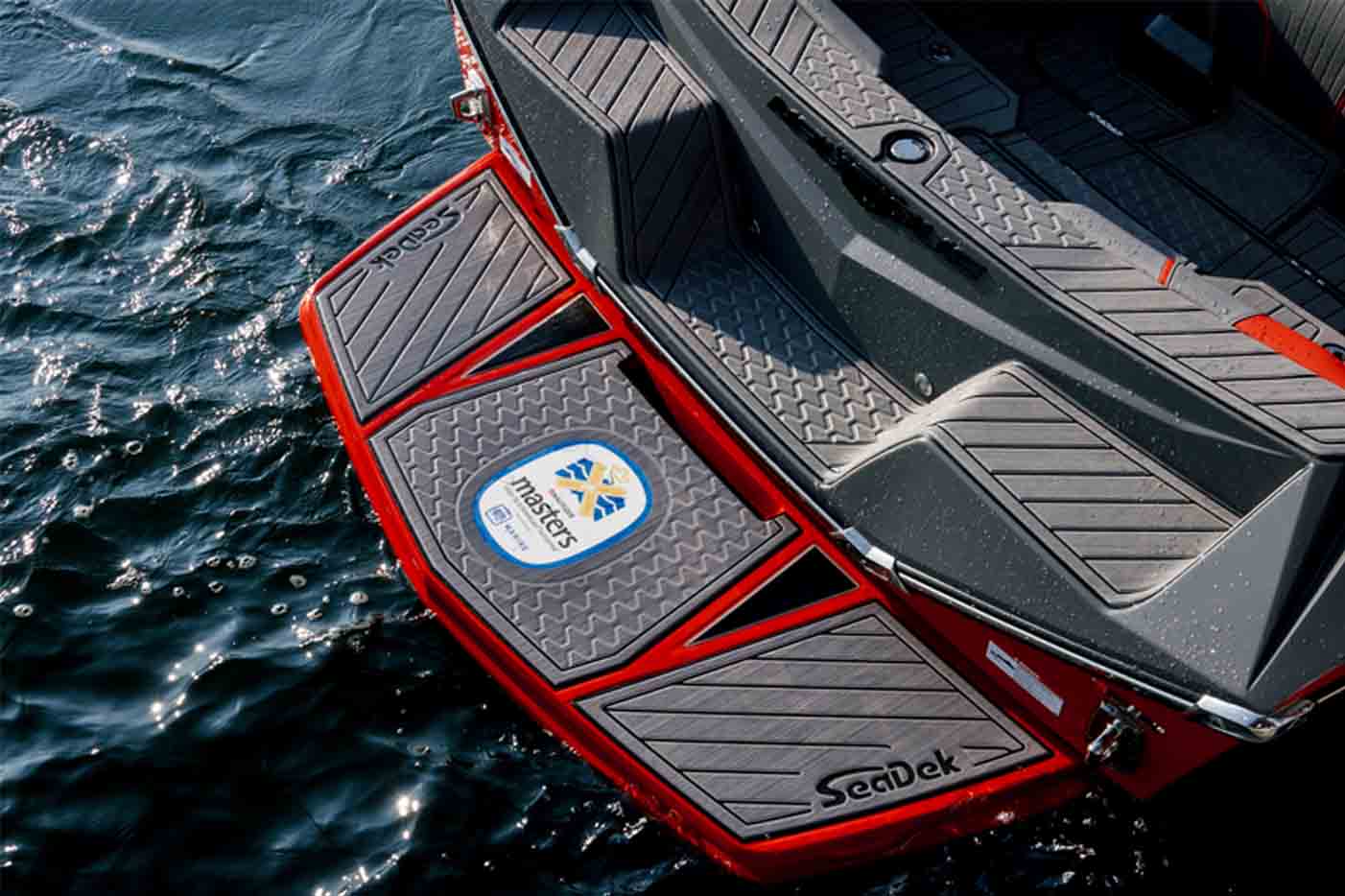 Custom SeaDek boat flooring with bold geometric routed pattern and logo design. seadek vs boat flooring florida